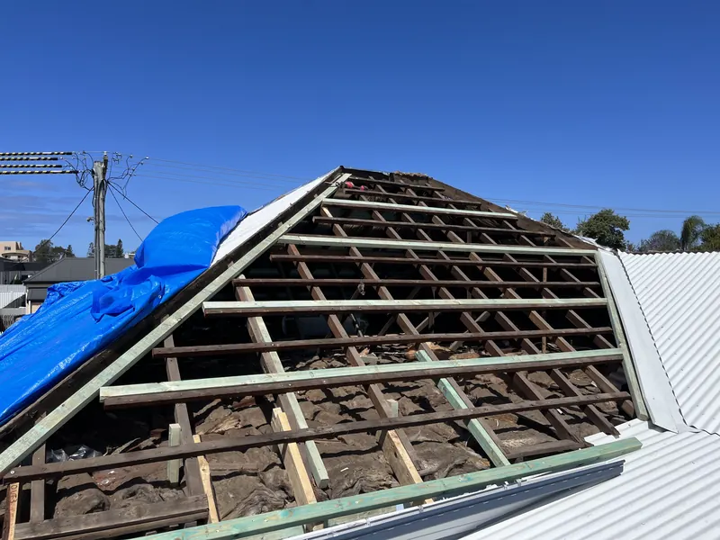 Roof frame opened up while new metal sheets are installed