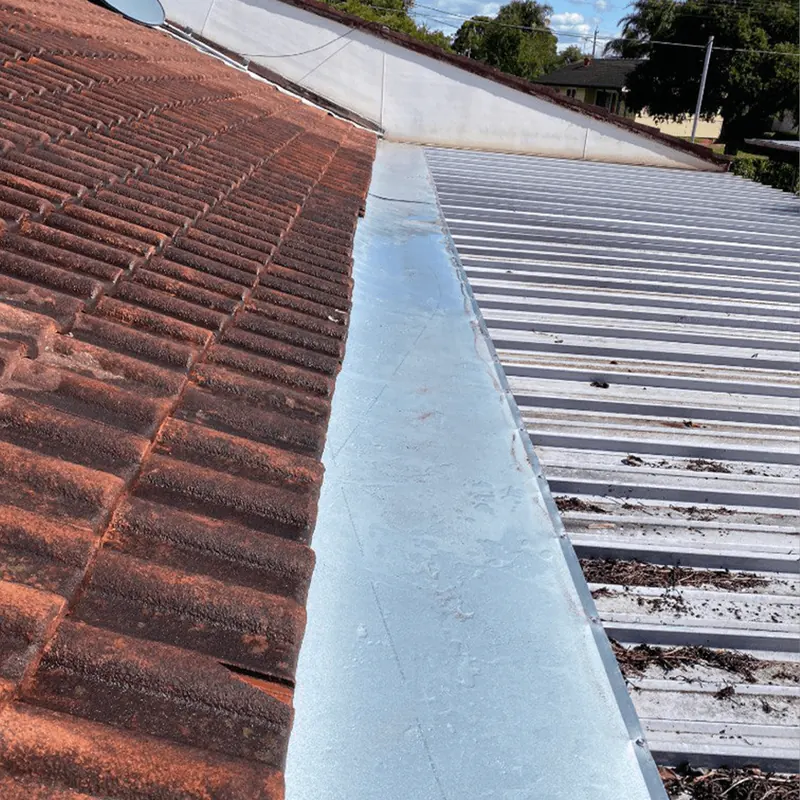 Custom valley flashing in a tile roof