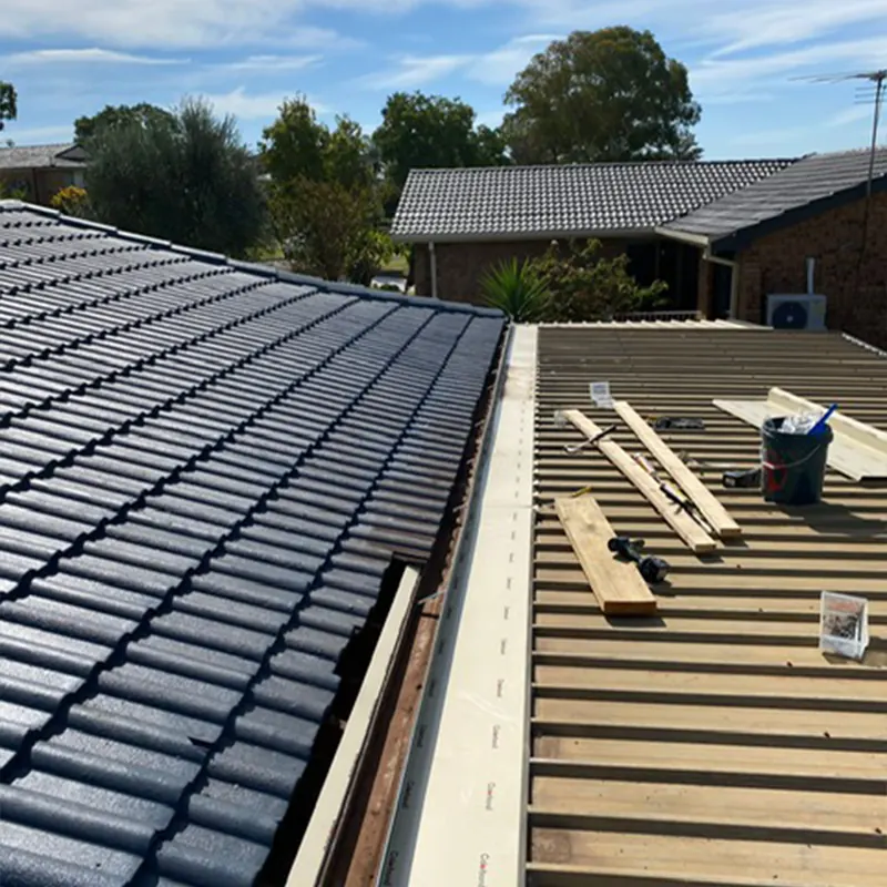 Tile roof being converted to metal roofing